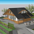 Wooden House with Black Roof Wooden Deck and Outdoor Seating Area Surrounded by Trees