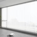 White Vertical Blinds For Large Window In Modern Room With Green Plant And Robot Vacuum