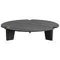 Round Dark Wood Coffee Table With Sturdy Angular Legs And Brass Accents
