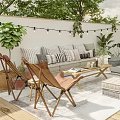 Cozy Outdoor Garden With Seating Furniture String Lights And Greenery