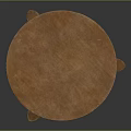 Elegant Round Wooden Table With Curved Legs And Textured Top Surface