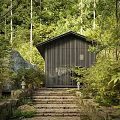 Natural Rockery Stones In Modern Outdoor Garden With Trees Grass And Lighting