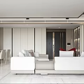 Modern Dining and Living Room With Gray Sofa Red Accent Chair Wooden Cabinets And Natural Light