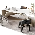 Modern Curved Desk with Laptop Books Vase and Stylish Chairs