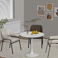 Modern White Round Table With Light Dark Chairs Fruit Plate Wall Art