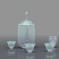 Blue Transparent Tea Set With Handle Lid Teapot And Small Teacups On Dark Background