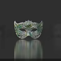 Decorative Green And White Mask With Lotus Flower Center And Intricate Scroll Patterns