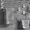 Modern Bathroom Accessories Including Shelves Towel Racks Soap Dispensers Towels And Toothbrush Holders