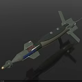 Military Guided Aerial Weapon With Streamlined Gray Body Blue Sections And Tail Fins