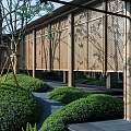 Tranquil Residential Landscape With Wooden Lattice Structures Lush Green Shrubs And Stone Pathway
