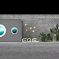 Mercedes EQ Display Stage With Gray Backdrop Circular Design EQE Logo And Plants