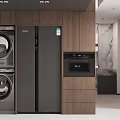 Modern Kitchen Interior With Black Refrigerator Stacked Washing Machine Oven And Wooden Cabinets