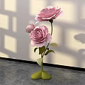 Decorative Floral Art Installation With Pink Roses Green Vase And Shadow Effects