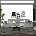Modern Living Room Interior Design With Black Sofa Wall Art And Potted Plant