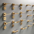 Collection of Different Styles Golden Door Handles and Locks on Gray Background