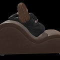 Barefoot Woman With Brown Hair In Black Patterned Top And Shorts On Brown Curved Sofa