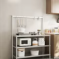 Wooden Kitchen Cabinets Featuring Metal Shelf Microwave Cooking Utensils And Storage Boxes