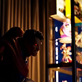 Illuminated Display Cabinet With Multiple Shelves Holding Collectible Models And Superman Statue