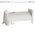 Cozy Beige Linen Upholstered Footstool With Draped Knitted Blanket And Book