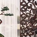 Pine Bonsai Plant In Brown Pot With Carved Screen And Curtain Decoration