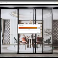 Stylish Glass Sliding Door With Black Frame In Modern Dining Room With Table And Bookshelf