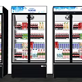 Three Glass Door Commercial Display Refrigerators With Beverages In Supermarket