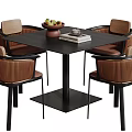Modern Square Black Dining Table and Chair Set with Brown Woven Design and Fruit Bowl