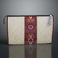 Ethnic Woven Clutch Bag With Intricate Embroidered Patterns And Tassel