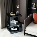 Sleek Modern Black Side Table With Coffee Cup Books Flower Vase And Sofa