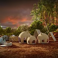 Unique Campsite With Various Shaped Tents Surrounded By Trees And Red Cliffs At Dusk