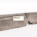 Ancient Stone And Wood Carved Architectural Elements With Broken Inscription Letters