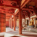 Traditional Chinese Ancient Architecture With Green Roofs Red Wooden Columns Stone Steps And Interior Statues