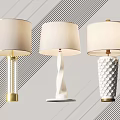 Three Modern Table Lamps With Glass Twisted And Textured Bases And White Fabric Shades