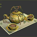 Yellow Teapot With Red Decorations And Floral Patterns On White Tray With Green Leaf Bowls