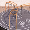 Outdoor Sports Equipment With Orange Metal Frames And Circular Fitness Area