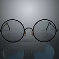 Sleek Black Round Eyeglasses With Metal Frame And Reflection On Gray Background