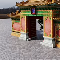 Traditional Chinese Ancient Gateway Architecture with Yellow Roof Red Walls Green Decor and Trees