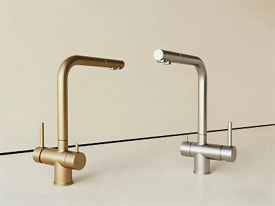 Two Modern Sleek Golden and Silver Faucets On Light Colored Countertop 3d model