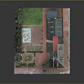 Modern Courtyard Scene With Red Brick Buildings Gray Roofs Green Lawn Fountain And Flags