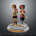 Traditional Costume Figures On Round Base With Headwear And THE CANNON