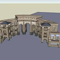 Elegant Classical Entrance Gate Featuring Arched Doorways Ornate Columns And Stone Facade