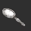 Vintage Carved Hand Mirror With Oval Frame And Textured Handle Design