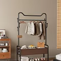 Black Metal Clothes Rack with Hanging Clothes and Accessories on Lower Shelf in Modern Home