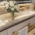 Luxurious Bathroom With White Flowers Marble Countertop Double Sinks Golden Faucets And Towel Rack