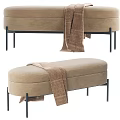Beige Fabric Sofa Bench With Black Metal Legs And Striped Throw Blanket