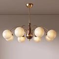 Elegant Brass Chandelier with White Glass Spherical Bulbs and Metal Frame for Home Ceiling Lighting