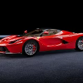 Red Sports Car With Convertible Top And Sleek Design On Dark Floor