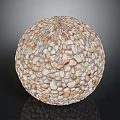 Pebble Covered Decorative Sphere With Textured Surface For Home Decor