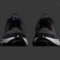 Modern Nike Athletic Sneakers with Dark Gray Upper Blue Red Accents and White Sole
