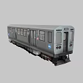 Gray Subway Train Car With Metal Body Multiple Windows Doors And Logo